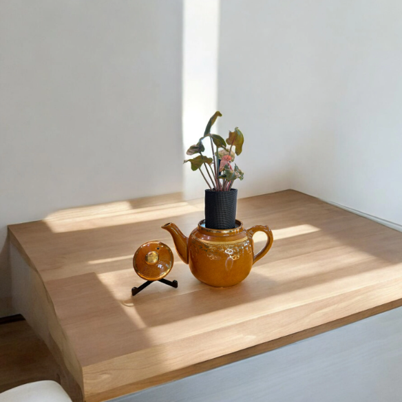 Vintage Burnt Orange Teapot Planter with Arrowhead Plant