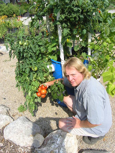 Chris Jaworski with Original Octopot Garden in full bloom